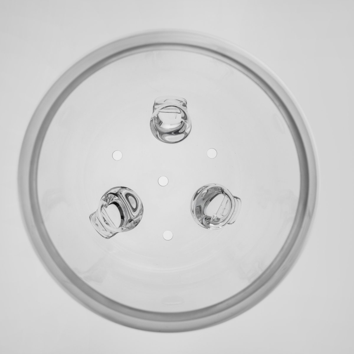 Freyven glass vessel showing solid feet and thick glass